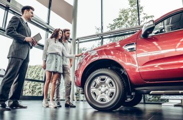 Salesman presenting special offers to clients