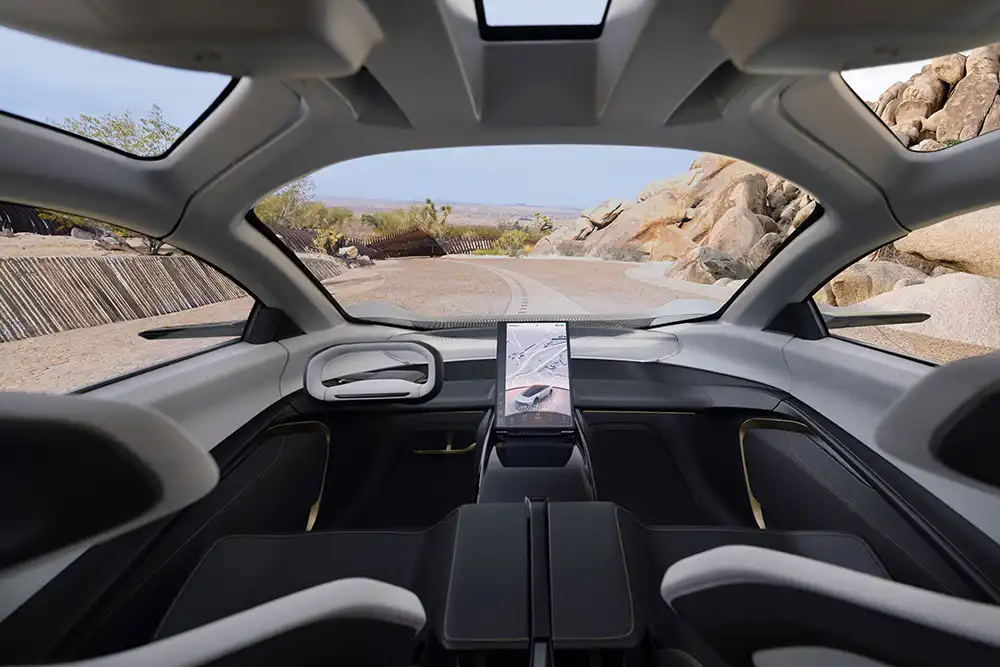 Das Cockpit des Chrysler Halcyon verzichtet auf Schalter und Knöpfe. Es gibt lediglich ein rechteckiges Lenkrad sowie einen großen Touchscreen. 