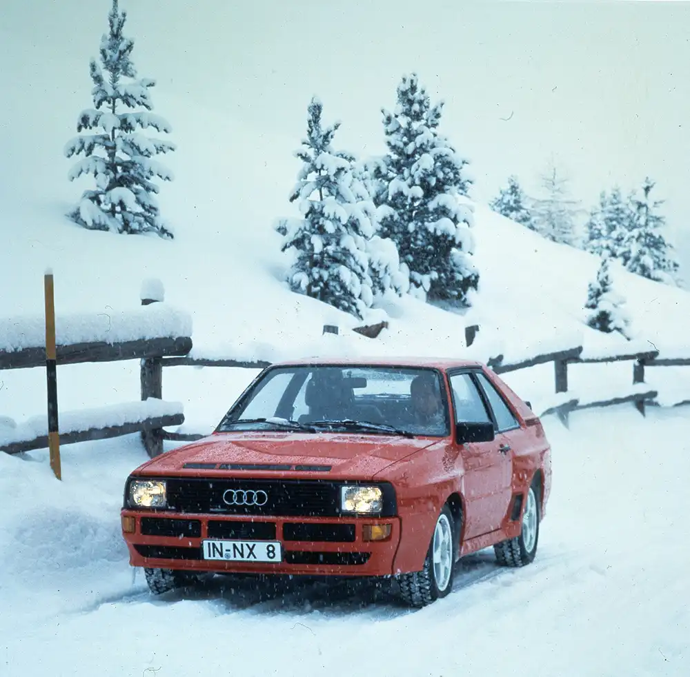 Audi zeigte schon im Extremwetterjahr 1984, wie eine „Gelände-Idee auf die Straße geht“.