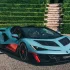 Lamborghini Fenomeno Roadster in Blu Cepheus mit Rosso Mars Akzenten in einer Parkanlage.
