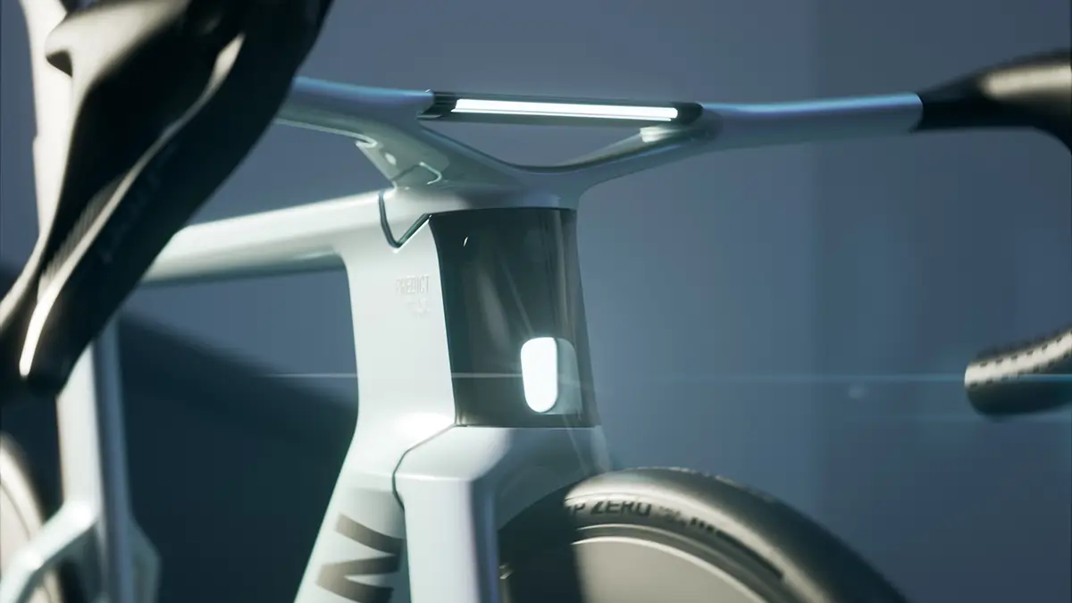 Nahaufnahme des Steuerrohr- und Gabelbereichs des Canyon Predict mit einem dezent im matten Rahmen bündig integrierten LED-Scheinwerfer.
