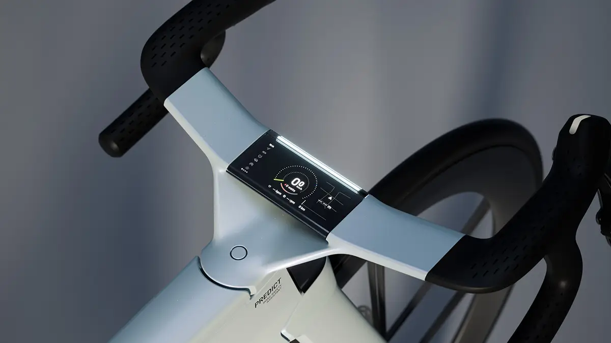 Draufsicht auf das flache Carbon-Cockpit des Canyon Predict mit einem breiten Farbdisplay, das nahtlos in die Oberseite der Lenker-Vorbau-Einheit eingelassen ist.